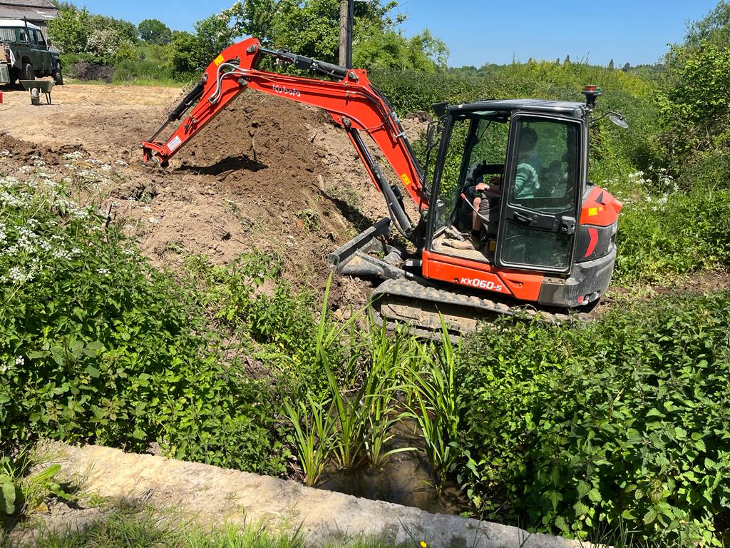 Digger reshaping the wetland at Owletts Farm